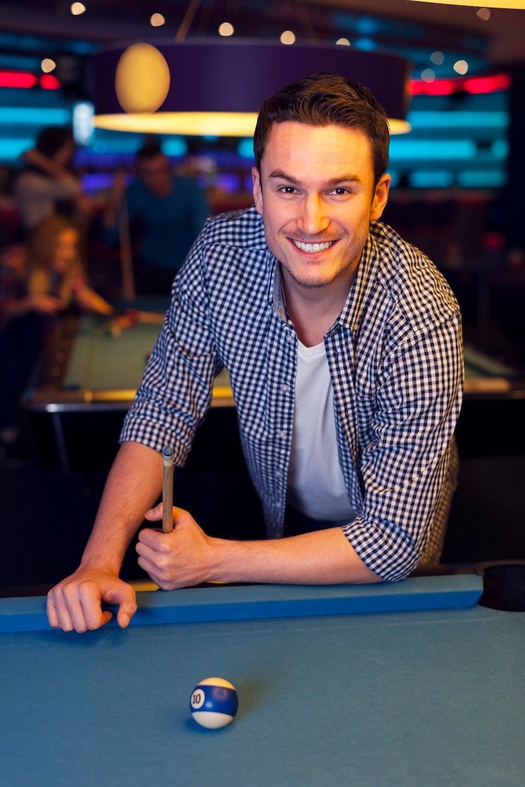 Live dealer at batara888 broadcasting blackjack game in professional studio setup with multiple cameras